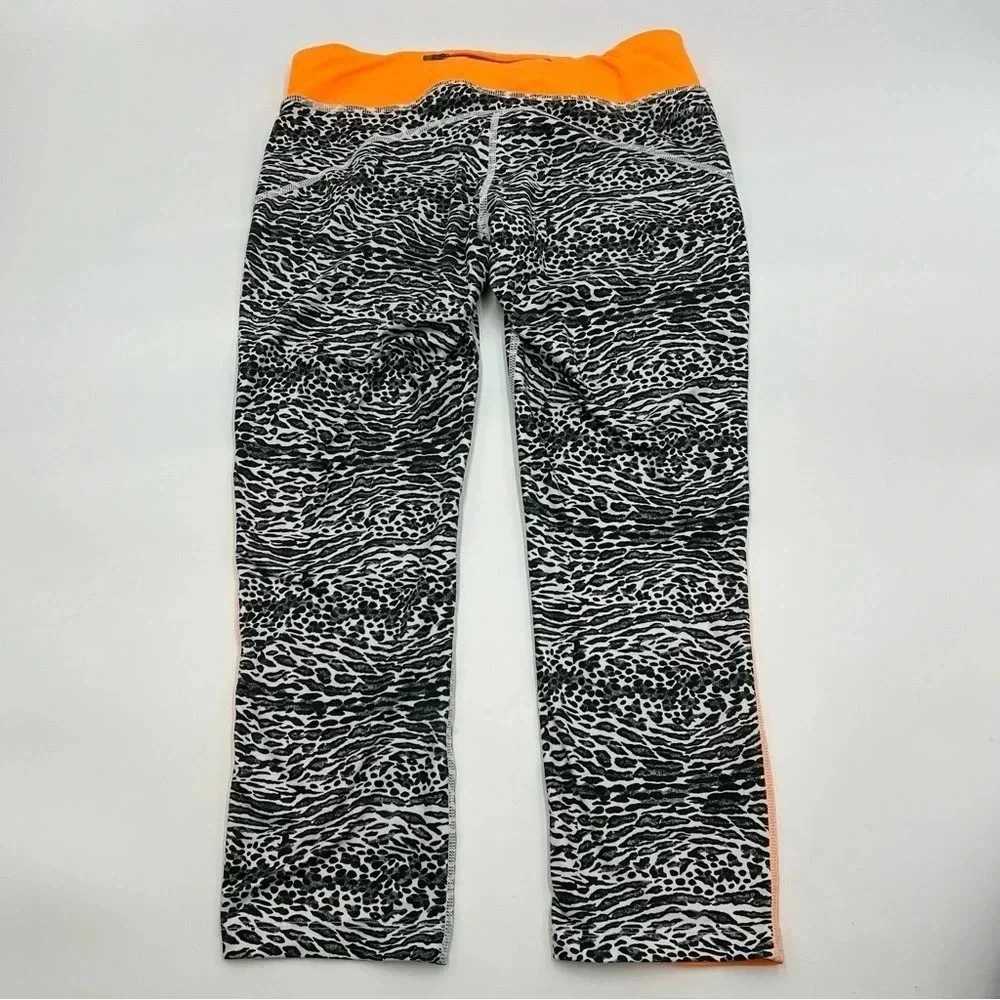 NIKE Women’s M Racer Leopard Print Running‎ Crop Leggings zipper pocket Dri-fit